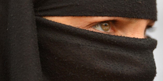 A Kashmiri member of the Association of Parents of the Disappeared (APDP) takes part in a protest on the international Human Rights Day in Srinagar on December 10, 2016. Indian forces in Kashmir are often blamed for grave rights abuses like widespread torture, rape, custodial murder and enforced disappearences in the Muslim-majority region which is divided and administered separately by India and Pakistan but claimed in full by both. / AFP PHOTO / Tauseef MUSTAFA (Photo credit should read TAUSEEF MUSTAFA/AFP/Getty Images)