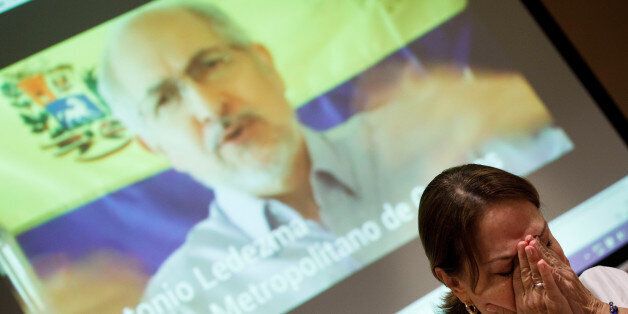 Mitzy Capriles de Ledezma, wife of former Caracas mayor Antonio Ledezma, reacts during a video showing her husband during a news conference in Madrid, Spain August 1, 2017. REUTERS/Sergio Perez
