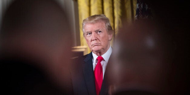 WASHINGTON, DC - JULY 31: President Donald Trump stands with retired Army medic James McCloughan before bestowing the nation's highest military honor, the Medal of Honor, to him at a ceremony in the East Room of the White House in Washington, DC on Monday, July 31, 2017. (Photo by Jabin Botsford/The Washington Post via Getty Images)