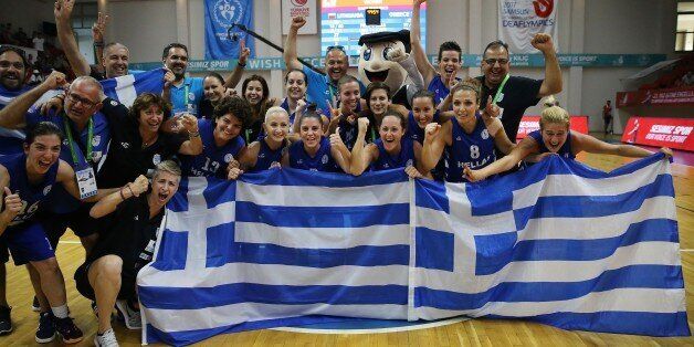 SAMSUN, TURKEY - JULY 29: Players of Greece celebrate their championship after the Women's basketball final match between Greece and Lithuania within the 23rd Summer Deaflympics 2017 at Mustafa Dagistanli Sports Center in Samsun, Turkey on July 29, 2017. (Photo by Metin Aktas/Anadolu Agency/Getty Images)