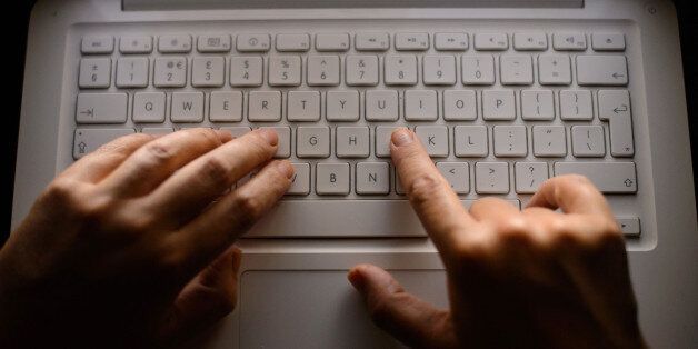 File photo dated 06/08/13 of someone using a laptop keyboard. Social media sites designed to help people connect are actually causing them to feel more alone, say psychologists.