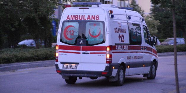 An ambulance is seen on the road during the sunrise in summer in Ankara, Turkey on July 13, 2017. (Photo by Altan Gocher/NurPhoto via Getty Images)