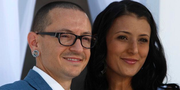 Chester Bennington of Linkin Park and wife Talinda arrive at the 2012 Billboard Music Awards in Las Vegas, Nevada, May 20, 2012. REUTERS/Steve Marcus (UNITED STATES - Tags: ENTERTAINMENT) (BILLBOARD-ARRIVALS)
