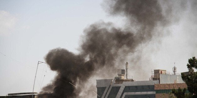 KABUL, AFGHANISTAN-JULY 31: Smoke rises after bomb laden vehicle targeted Iraqi embassy in Kabul, Afghanistan on July 31, 2017. (Photo by Haroon Sabawoon/Anadolu Agency/Getty Images)