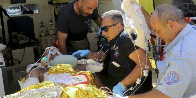 Medics transfer an man injured during an earthquake off the island of Kos, to the hospital of the city of Heraklion on the island of Crete, Greece July 21, 2017. REUTERS/Stefanos Rapanis