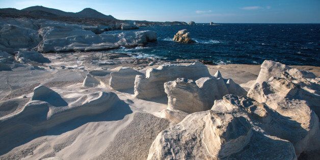 Mineral formations on the coast of Milos island (Moon landscape) Aegean sea, Greece.