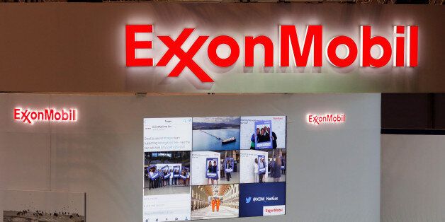 Logos of ExxonMobil are seen in its booth at Gastech, the world's biggest expo for the gas industry, in Chiba, Japan April 4, 2017. REUTERS/Toru Hanai