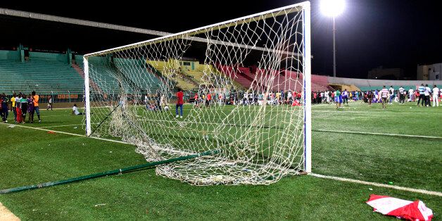 A vandalized goal is seen at Demba Diop stadium July 15, 2017 in Dakar after a football game between local teams Ouakam and Stade de Mbour.Eight people were killed during Senegal's football league final in Dakar on Saturday in a stampede that broke out following clashes at the end of the match, the official APS news agency said. The wall collapse adding many more to be injured. A wall collapsed as people attempted to leave, adding many more were injured. Police fired tear gas at clashing supporters from both teams who were throwing projectiles, and panic spread in the stadium leading to a crush. / AFP PHOTO / SEYLLOU (Photo credit should read SEYLLOU/AFP/Getty Images)