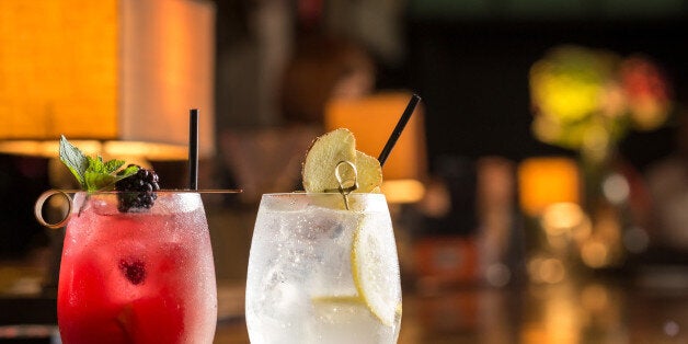 Two glasses of frozen lemonade on bar counterTwo glasses of frozen lemonade on bar counter