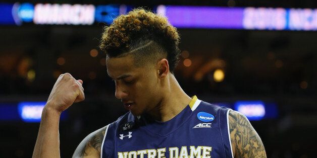 PHILADELPHIA, PA - MARCH 27: Zach Auguste #30 of the Notre Dame Fighting Irish celebrates after a basket in the second half against the North Carolina Tar Heels during the 2016 NCAA Men's Basketball Tournament East Regional Final at Wells Fargo Center on March 27, 2016 in Philadelphia, Pennsylvania. (Photo by Elsa/Getty Images)
