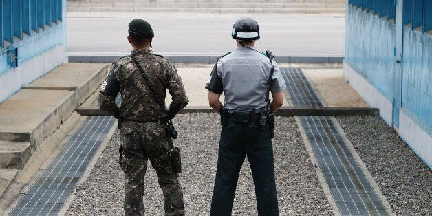 PANMUNJOM, SOUTH KOREA - JULY 12: South Korean soldiers stand guard at the border village of Panmunjom between South and North Korea at the Demilitarized Zone (DMZ) on July 12, 2017 in Panmunjom, South Korea. South Korea, Japan and the United States agreed on Wednesday to put 'maximum pressure' on North Korea as frustrations has grown since Pyongyang launched an intercontinental ballistic missile that some experts say could reach Alaska or other parts of the U.S. west coast. The latest launch have drawn strong criticism from the U.S. as experts believe the ICBM has the range to reach the U.S. states of Alaska and Hawaii and perhaps the U.S. Pacific Northwest. (Photo by Chung Sung-Jun/Getty Images)