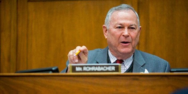 Representative Dana Rohrabacher, a Republican from California, questions Retired General John Allen, the special presidential envoy for the global coalition against Islamic State, not pictured, in Washington, D.C., U.S., on Thursday, March 26, 2015. The U.S. and allies began airstrikes on the Iraqi city of Tikrit, supporting Iranian-backed Shiite militias seeking to expel Islamic State fighters from the area. Asked whether Iran could end up controlling Iraq, Allen said, 'I don't think that's going to be the case. In the end, Iraq is an Arab country.' Iranians, he said, 'are a different people.' Photographer: Andrew Harrer/Bloomberg via Getty Images