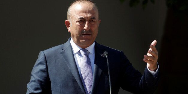 Turkey's Foreign Minister Mevlut Cavusoglu speaks to the media during a visit in the Turkish Cypriot northern part of the divided city of Nicosia, June 1, 2017. REUTERS/Yiannis Kourtoglou