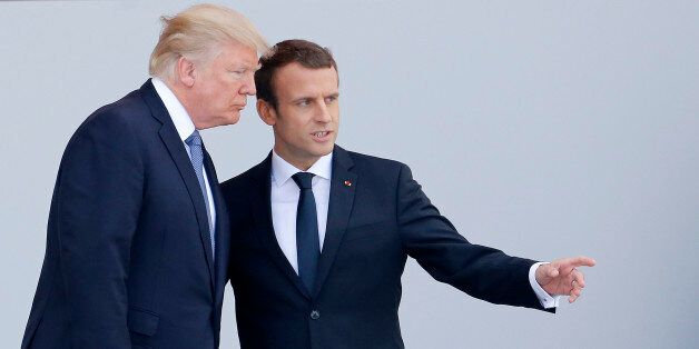 PARIS, FRANCE - JULY 14: U.S President Donald Trump and French President Emmanuel Macron attend the traditional Bastille day military parade on the Champs-Elysees on July 14, 2017 in Paris France. Bastille Day, the French National day commemorates this year the 100th anniversary of the entry of the United States of America into World War I. (Photo by Chesnot/Getty Images)