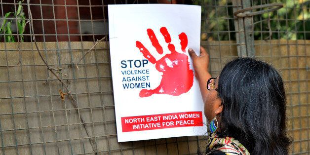 NEW DELHI,INDIA FEBRUARY 21: NO TO SEXUAL VIOLENCE condemn the brutal assault and rape of 24 year old girl in Hauz Khas village in New Delhi.(Photo by Ramesh Sharma/India Today Group/Getty Images)