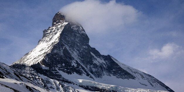 The Matterhorn mountain is pictured in Zermatt, Switzerland, March 15, 2015. The remains of two young Japanese climbers missing on the Matterhorn mountain since a 1970 snow storm in the Swiss Alps have been identified through DNA testing of their relatives, police said on Thursday. Human bones spotted by a climber last September on a shrinking glacier at an altitude of 2,800 meters were sent to the medical examiner for identification, cantonal (state) police in the Valais said. Picture taken March 15, 2015. REUTERS/Denis Balibouse