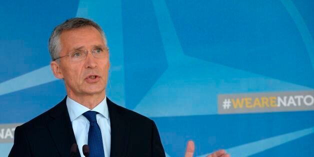 NATO Secretary General Jens Stoltenberg gestures as he talks to the media at the NATO headquarters in Brussels, on July 13, 2017. / AFP PHOTO / THIERRY CHARLIER (Photo credit should read THIERRY CHARLIER/AFP/Getty Images)