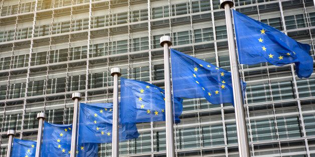 European Union flags in front of the Berlaymont building (European commission) in Brussels, Belgium.