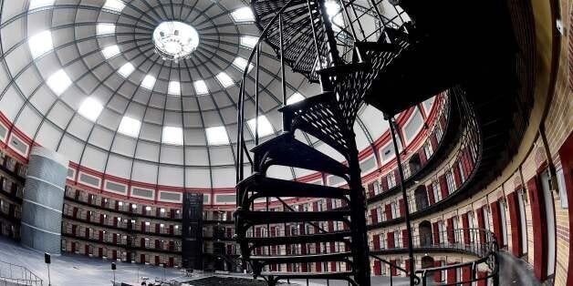 This photo taken on June 9, 2017 shows the inside of Boschpoort Prison, a dome-shaped prison in Breda, which is being transformed into offices and an entertainment venue following a drop in incarcerations in Dutch prisons for the past 20 years.The voices echo under the majestic and luminous dome of the prison of Breda, in the south of the Netherlands. They break the silence in this 130-year-old building, empty of all detainees like dozens of other penitentiary establishments in the country, and now utilized for a completely different use. / AFP PHOTO / EMMANUEL DUNAND (Photo credit should read EMMANUEL DUNAND/AFP/Getty Images)