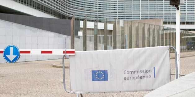 A European Union (EU) flag sits on a barrier outside the European Commission Berlaymont building in Brussels, Belgium, on Thursday, March 30, 2017. Prime Minister Theresa May kickstarted the formal withdrawal from the European Union on Wednesday, leaving businesses and investors facing the realities of Brexit and changes to everything from regulation to the movement of workers and goods. Photographer: Jasper Juinen/Bloomberg via Getty Images