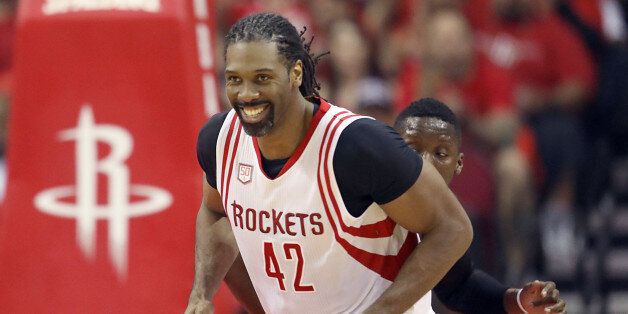 Apr 25, 2017; Houston, TX, USA; Houston Rockets center Nene Hilario (42) smiles after making a basket agains the Oklahoma City Thunder in the first half in game five of the first round of the 2017 NBA Playoffs at Toyota Center. Mandatory Credit: Thomas B. Shea-USA TODAY Sports