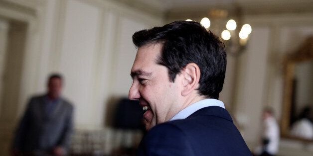 Greek Prime Minister Alexis Tsipras arrives for a meeting with members of the board of the Hellenic Bank Association at the Maximos Mansion in Athens, Greece, February 28, 2017. REUTERS/Alkis Konstantinidis