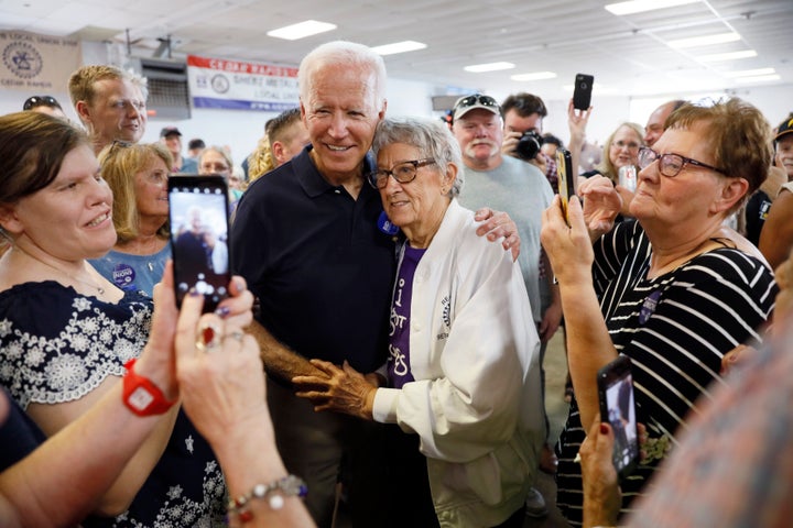 Democratic presidential candidate former Vice President Joe Biden gets a hug from Ruth Nowadzky, of Cedar Rapids, Iowa, during the Hawkeye Area Labor Council Labor Day Picnic, Monday, Sept. 2, 2019, in Cedar Rapids, Iowa. 