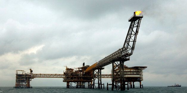 EDITORS' NOTE: Reuters and other foreign media are subject to Iranian restrictions on their ability to film or take pictures in Tehran.The SPQ1 gas platform is seen on the southern edge of Iran's South Pars gas field in the Gulf, off Assalouyeh, 1,000 km (621 miles) south of Tehran, January 26, 2011. Picture taken January 26. REUTERS/Caren Firouz (IRAN - Tags: BUSINESS ENERGY)
