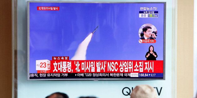 SEOUL, SOUTH KOREA - JULY 04: People watch a television broadcast reporting the North Korean missile launch at the Seoul Railway Station on July 4, 2017 in Seoul, South Korea. North Korea fired an unidentified ballistic missile on Tuesday from a location near the North's border with China into waters at Japan's exclusive economic zone, east of the Korean Peninsula, according to reports. The latest launch have drawn strong criticism from the U.S. and came ahead of a summit of leaders from the Group of 20 countries in Germany later this week. (Photo by Chung Sung-Jun/Getty Images)