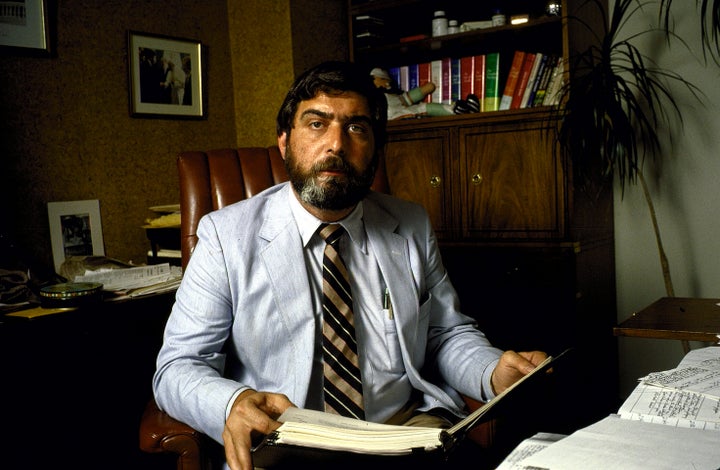 Pollster Pat Caddell in his office speaking re: "debategate" and holding Carter briefing book and materials from his 1980 campaign. (Photo by Diana Walker/The LIFE Images Collection via Getty Images)