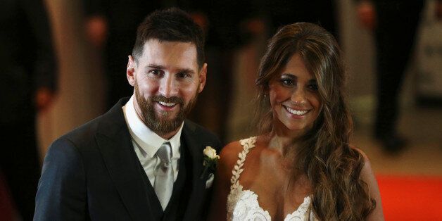 Argentine soccer player Lionel Messi and his wife Antonela Roccuzzo pose at their wedding in Rosario, Argentina, June 30, 2017. REUTERS/Marcos Brindicci