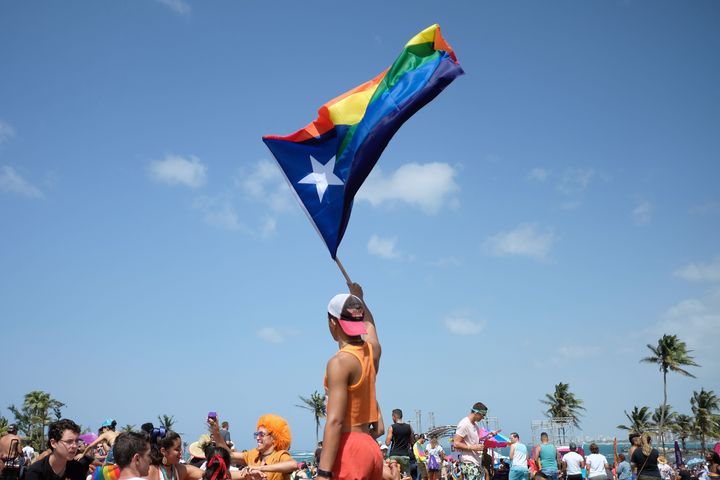 People take part in the annual Gay Pride parade in San Juan, Puerto Rico, on June 3, 2018. (Photo by Ricardo ARDUENGO / AFP) 