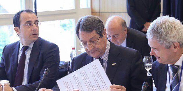 CRANS-MONTANA, SWITZERLAND - JUNE 29: Greek Cypriot leader Nicos Anastasiades (C) attends the Cyprus peace talks in Crans-Montana, Switzerland on June 29, 2017. Turkish Foreign Minister Mevlut Cavusoglu, Greek Foreign Minister Nikos Kotzias, UN chief's special adviser on Cyprus Espen Barth Eide, Turkish Cypriot President Mustafa Akinci and UN Under-Secretary-General for Political Affairs Jeffrey Feltman attended the session. (Photo by Cem Ozdel/Anadolu Agency/Getty Images)