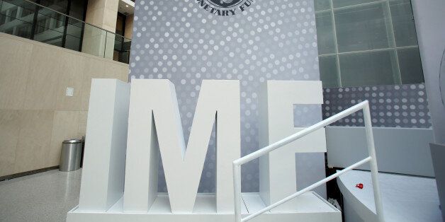 International Monetary Fund logo is seen inside the headquarters at the end of the IMF/World Bank annual meetings in Washington, U.S., October 9, 2016. REUTERS/Yuri Gripas