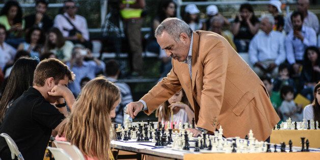 The chess chess grandmaster and former World Champion Garry Kasparov in a game against 15 young players aged 8 to 14 years who have been shortlisted by the Union Chess Thessaloniki. ?t the Stavros Niarchos Foundation Cultural Center. On June 23, 2015, Athens, Faliro(Photo by Wassilios Aswestopoulos/NurPhoto) (Photo by NurPhoto/NurPhoto via Getty Images)