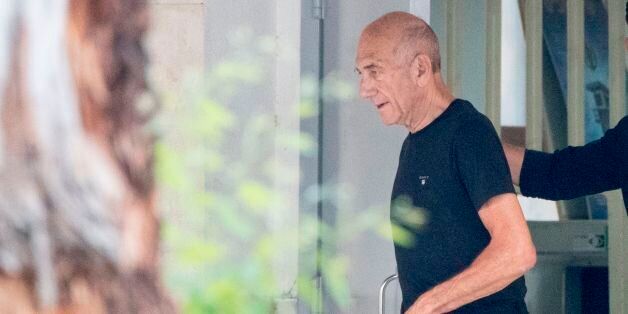 Former Israeli Prime Minister Ehud Olmert, 71, leaves the Maasyahu prison, on July 2, 2017 in Ramla. Israeli ex-prime minister Ehud Olmert was freed from prison after being granted parole in a corruption case that reduced his sentence by a third. The 71-year-old Olmert, premier between 2006 and 2009, was convicted of graft and entered prison in February 2016. He had been sentenced to 27 months. / AFP PHOTO / JACK GUEZ (Photo credit should read JACK GUEZ/AFP/Getty Images)