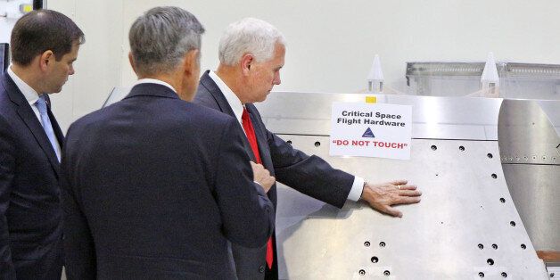 Vice President Mike Pence, right, gets a tour of the Orion clean room with Sen. Marco Rubio, left, by Bob Cabana, Director Kennedy Space Center, center, Thursday, July 6, 2017. (Red Huber/Orlando Sentinel/TNS via Getty Images)