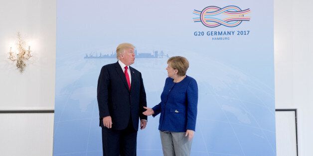 German Chancellor Angela Merkel meets U.S. President Donald Trump on the eve of the G-20 summit in Hamburg, Germany, July 6, 2017. REUTERS/Michael Kappeler/POOL