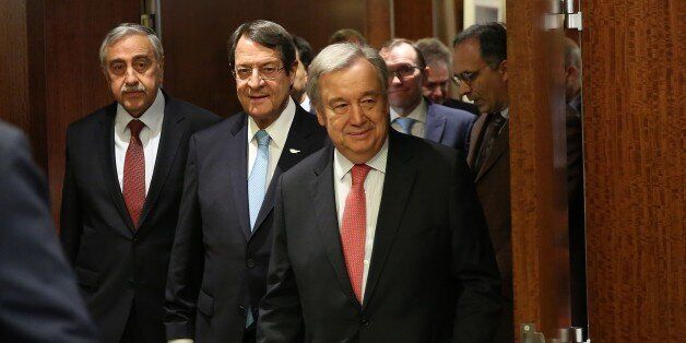 NEW YORK, USA - JUNE 4: UN Secretary-General AntÃ³nio Guterres (C) walks along with Greek Cypriot President Nicos Anastasiades (2nd L) and Turkish Cypriot President Mustafa Akinci (L) before a meeting at the United Nations headquarters in Manhattan borough of New York, United States on June 4, 2017. (Photo by Mohammed Elshamy/Anadolu Agency/Getty Images)