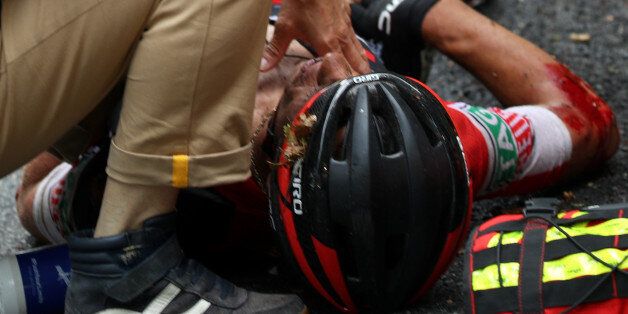 CHAMBERY, FRANCE - JULY 09: Richie Porte of Australia riding for BMC Racing Team is attended to by medical staff after crashing during stage 9 of the 2017 Le Tour de France, a 181.5km stage from Nantua to ChambÃ©ry on July 9, 2017 in Chambery, France. (Photo by Chris Graythen/Getty Images)