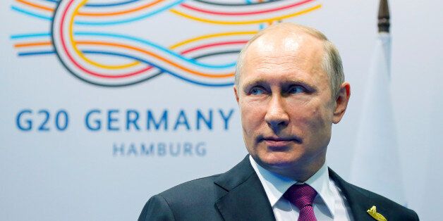 Russian President Vladimir Putin looks on before a meeting with Turkish President Tayyip Erdogan at the G-20 summit in Hamburg, Germany July 8, 2017. REUTERS/Alexander Zemlianichenko/Pool