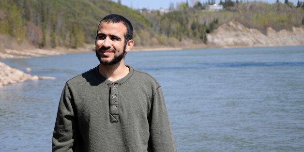 EDMONTON, AB - MAY 9: Omar Khadr stops near the North Saskatchewan river during his first long walk and bike ride on May 9, 2015, two days after being freed after having spent nearly half of his life in custody. (Michelle Shephard/Toronto Star via Getty Images)