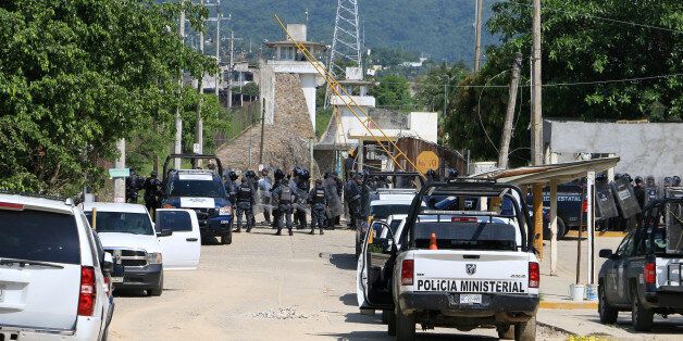 Riot police line up outside a prison after a riot broke out at the maximum security wing in Acapulco, Mexico, July 6, 2017. REUTERS/Troy Merida