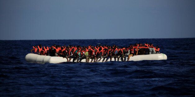 An overcrowded dinghy with migrants from different African countries is seen after members of the German NGO Jugend Rettet guided them towards the Iuventa vessel during a rescue operation, off the Libyan coast in the Mediterranean Sea September 21, 2016. REUTERS/Zohra Bensemra
