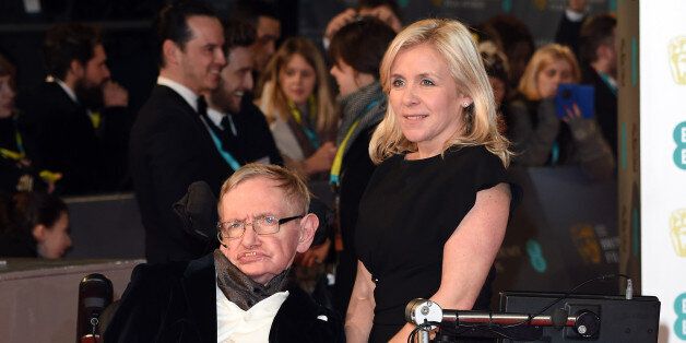 LONDON, ENGLAND - FEBRUARY 08: Stephen Hawking and daughter Lucy Hawking attend the EE British Academy Film Awards at The Royal Opera House on February 8, 2015 in London, England. (Photo by Karwai Tang/WireImage)