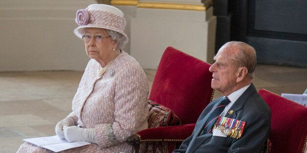Britain's Queen Elizabeth and Prince Phillip attend a service to commemorate the 70th anniversary of VJ Day in St Martin's in the Fields church, in London, Britain August 15, 2015. REUTERS/Arthur Edwards/Pool
