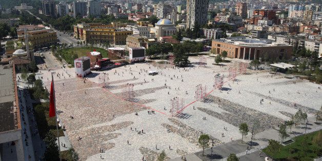 People walk on newly transformed Skenderbeg square in Tirana, Albania June 12, 2017. REUTERS/Florion Goga