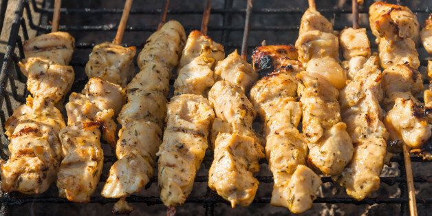 TORONTO, ONTARIO, CANADA - 2015/06/20: Meat cooking at the Taste of Little Italy Festival. Chicken and pork souvlaki (a Greek form of kebabs) sit on a grill. (Photo by Roberto Machado Noa/LightRocket via Getty Images)