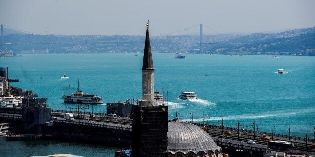 General view of the Bosphorus is seen after it has turned turquoise due to phytoplankton on June 14, 2017, in Istanbul. The Moderate Resolution Imaging Spectroradiometer (MODIS) on NASAÃs Aqua satellite first captured the phytoplankton bloom in the Black Sea on May 29. Phytoplankton consists of floating, microscopic organisms that make their own food from sunlight and dissolved nutrients. Ample water flow from rivers like the Danube and Dnieper carry nutrients to the Black Sea. In general, phytoplankton can support fish, shellfish and other marine organisms. Large, frequent blooms can lead to eutrophication Ã the loss of oxygen from water Ã and end up suffocating marine life. / AFP PHOTO / BULENT KILIC (Photo credit should read BULENT KILIC/AFP/Getty Images)