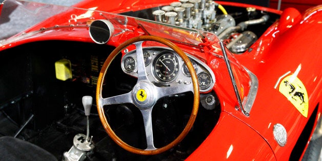 PARIS, FRANCE - FEBRUARY 02: The dashboard of the Ferrari 335 S Spider Scaglietti from the Pierre Bardinon collection is displayed for auction during the Retromobile show on February 02, 2016 in Paris, France. The car is manufactured by Ferrari workshops in early 1957 and is dressed with a Scaglietti bodywork. It is equipped with a Tipo 140 V12 (315 S) 3.8-liter twin overhead camshafts per cylinder, developing some 360 bhp. This car is estimated between 28 and 32 Millions euros / 30 and 34 Mill